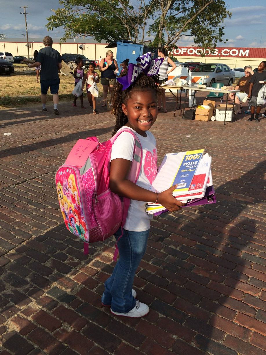 Ta'Niya shows off her brand new backpack.
